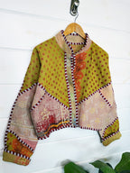Stevie style revival kantha jacket #2309, patchwork kantha on a hanger, front view