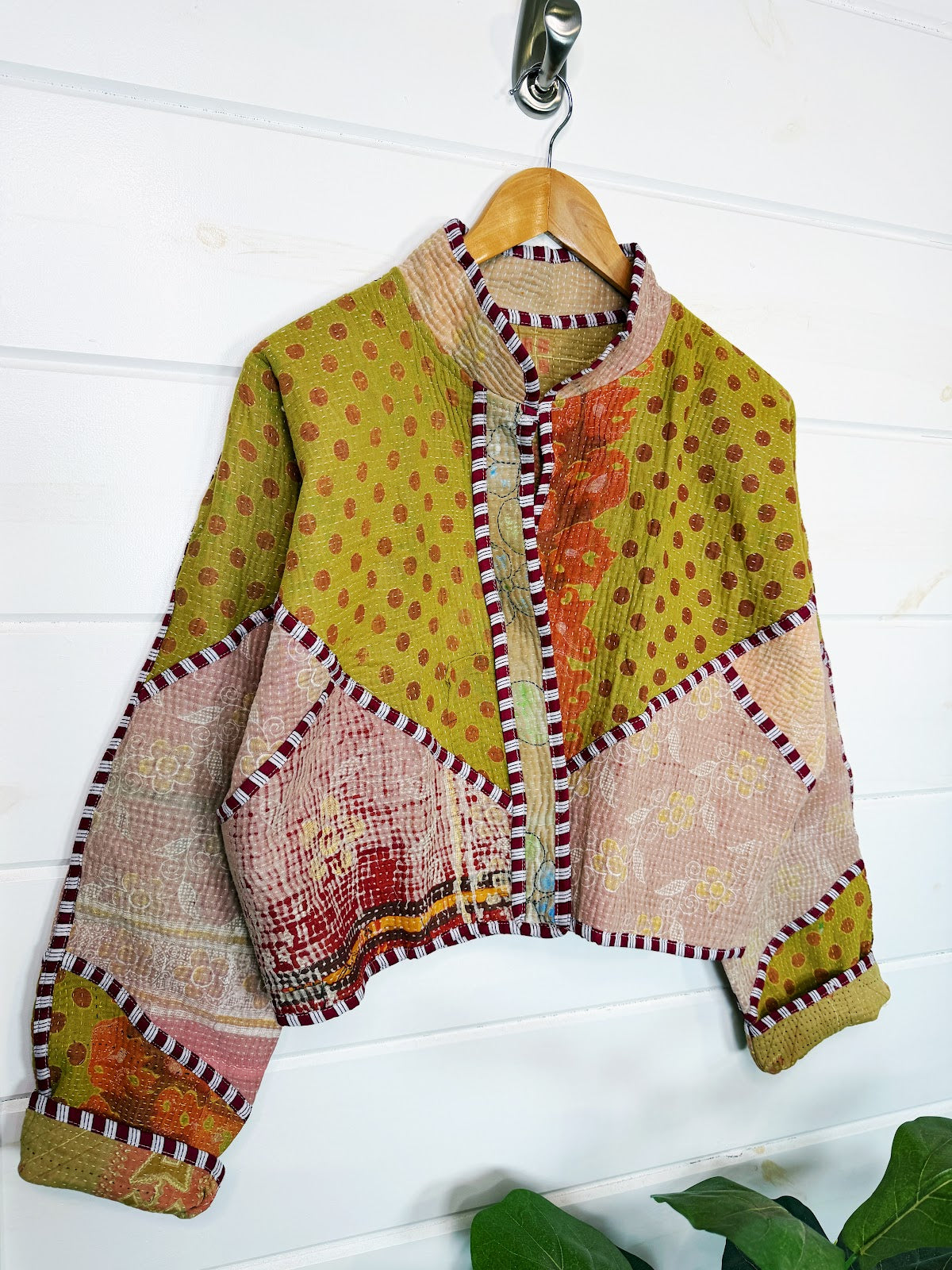Stevie style revival kantha jacket #2309, patchwork kantha on a hanger, front view