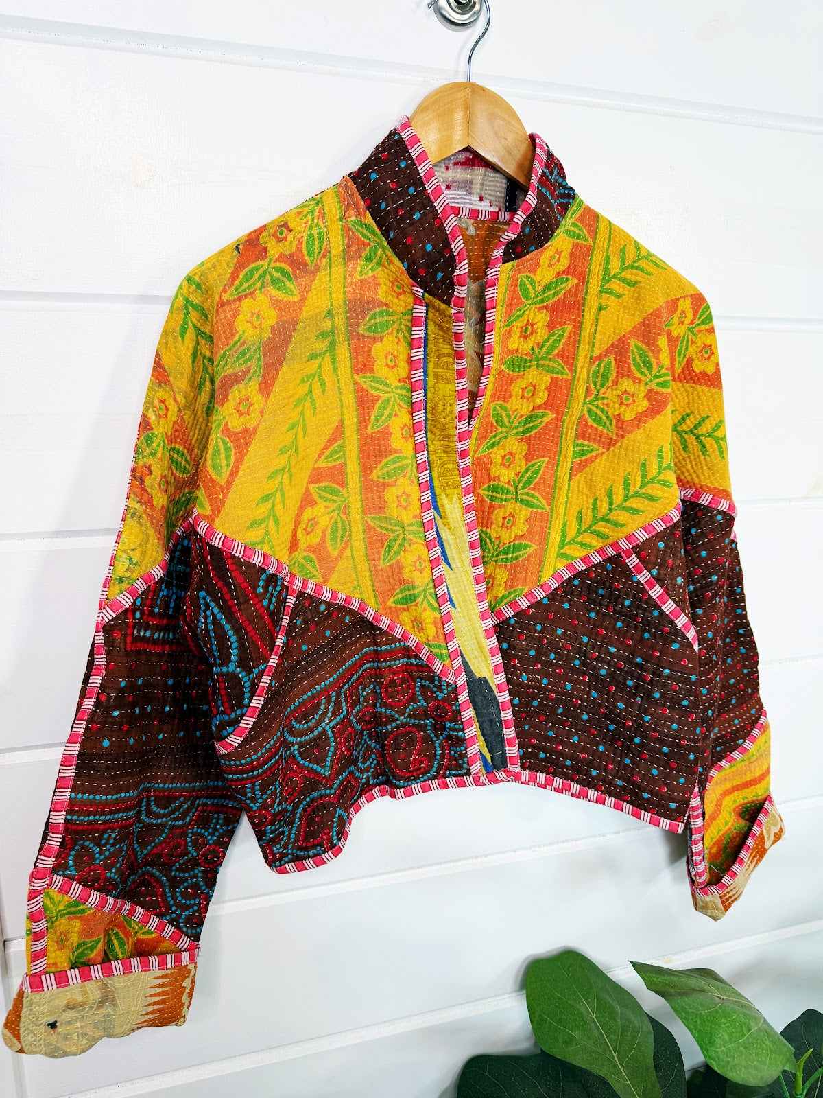 Stevie style revival kantha jacket #2315, patchwork kantha on a hanger, front view
