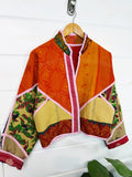 Stevie style revival kantha jacket #2314, patchwork kantha on a hanger, front view