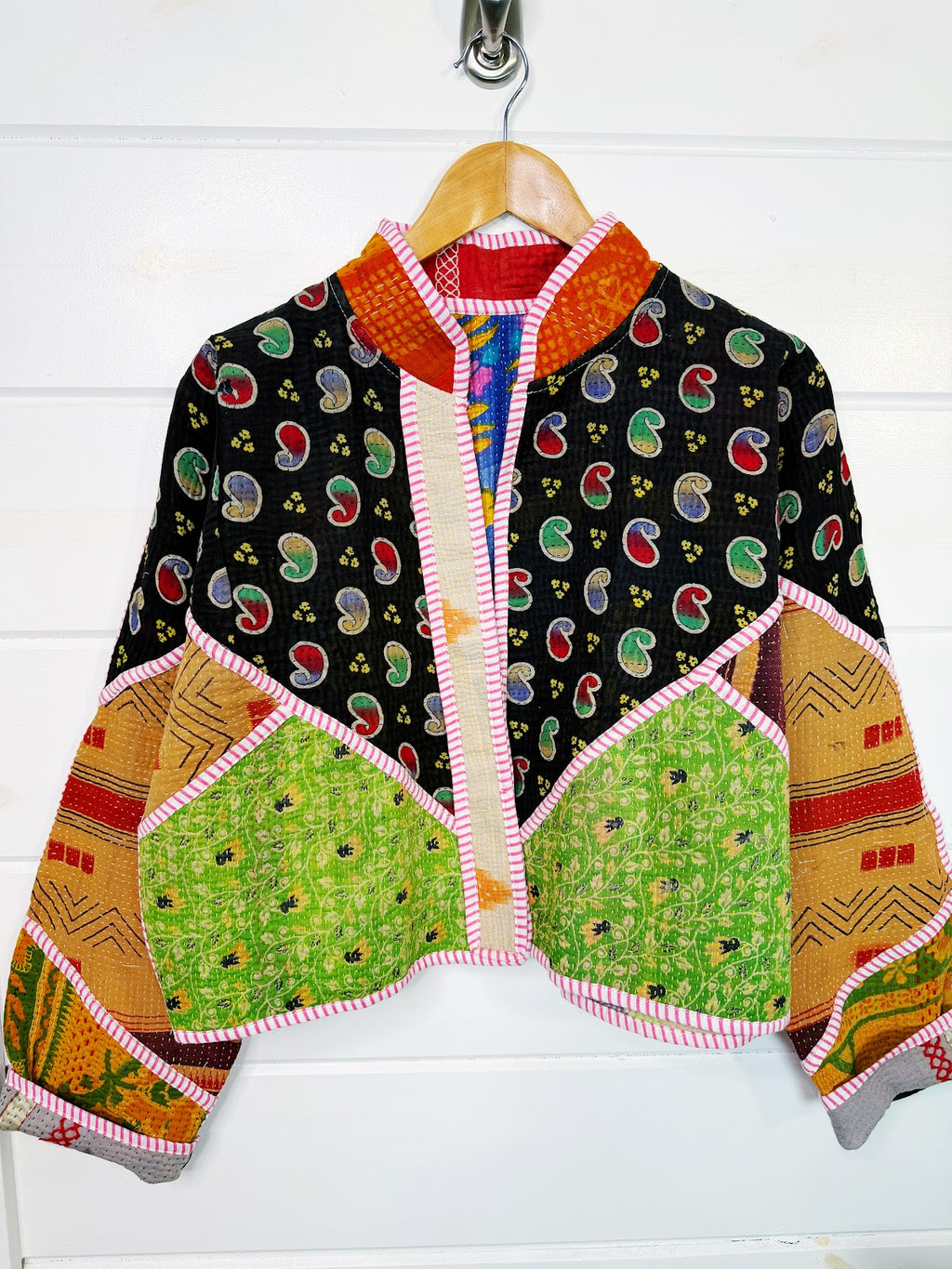 Stevie style revival kantha jacket #2310, on a hanger, front view with sleeves out