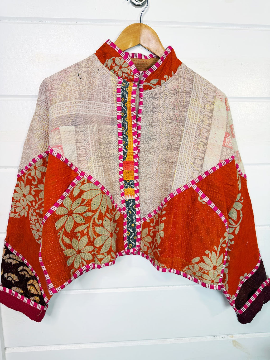 Stevie style revival kantha jacket #2308, on a hanger, front view with sleeves out