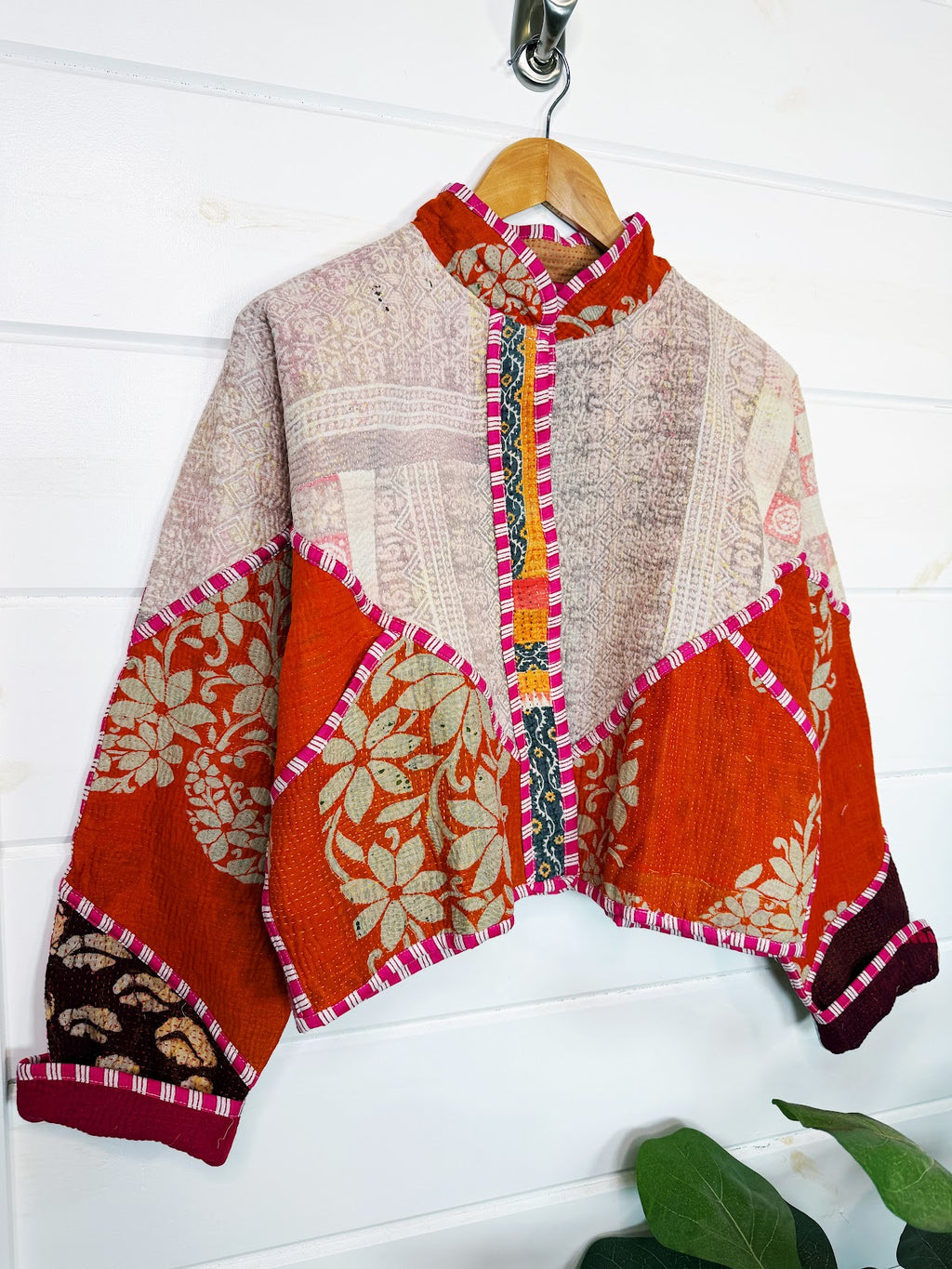 Stevie style revival kantha jacket #2308, patchwork kantha on a hanger, front view