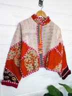 Stevie style revival kantha jacket #2308, patchwork kantha on a hanger, front view
