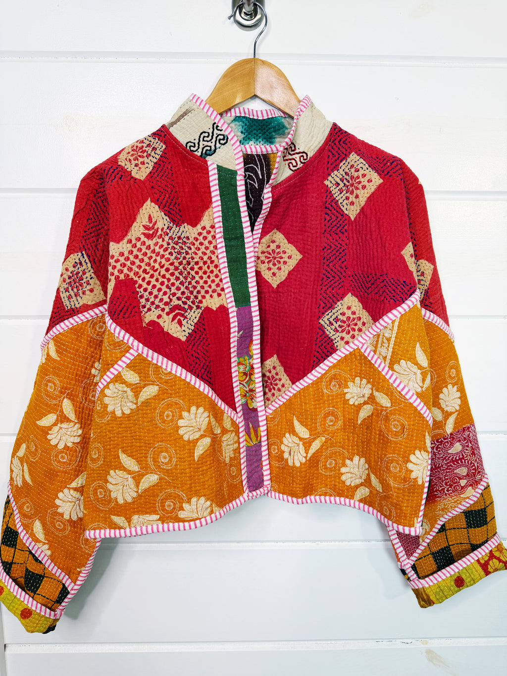 Stevie style revival kantha jacket #2303, on a hanger, front view with sleeves out